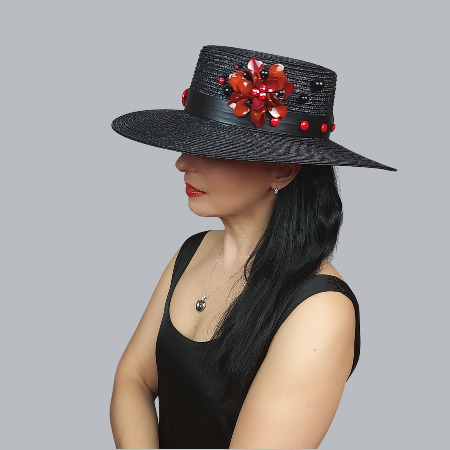 Black Straw Boater Hat with Red Flower Brooch – side view