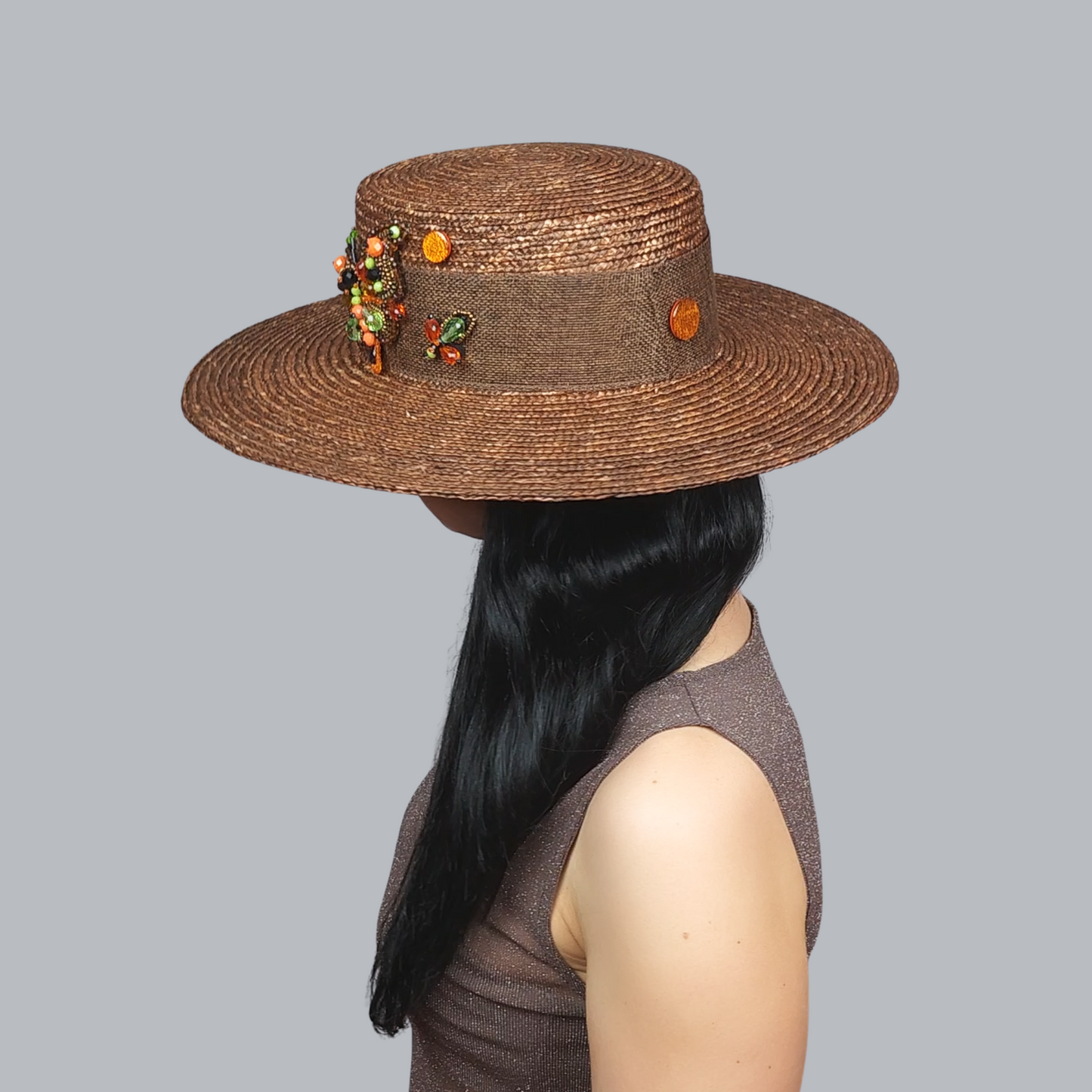 Brown Straw Boater Hat with Butterfly Brooch – side view from the back