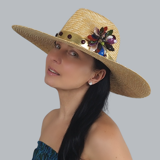 Golden Straw Fedora Hat with Flower Brooch close-up view