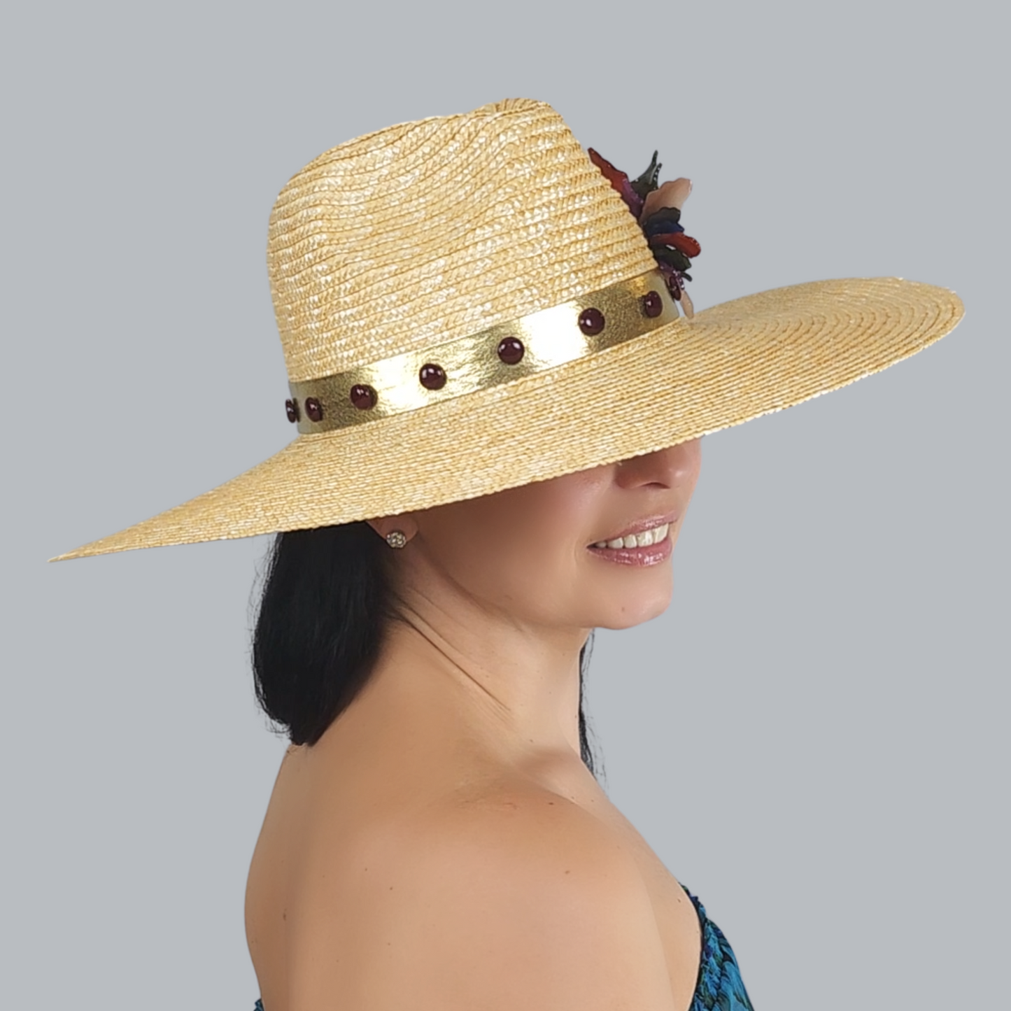 Golden Straw Fedora Hat with Flower Brooch side view of the decorated ribbon 