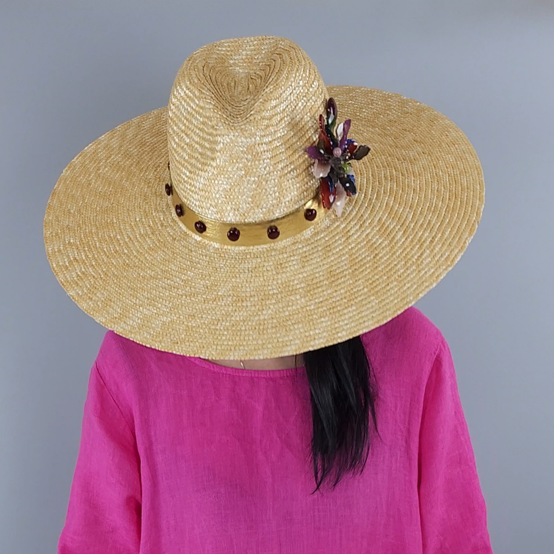 Golden Straw Fedora Hat with Flower Brooch close up view  