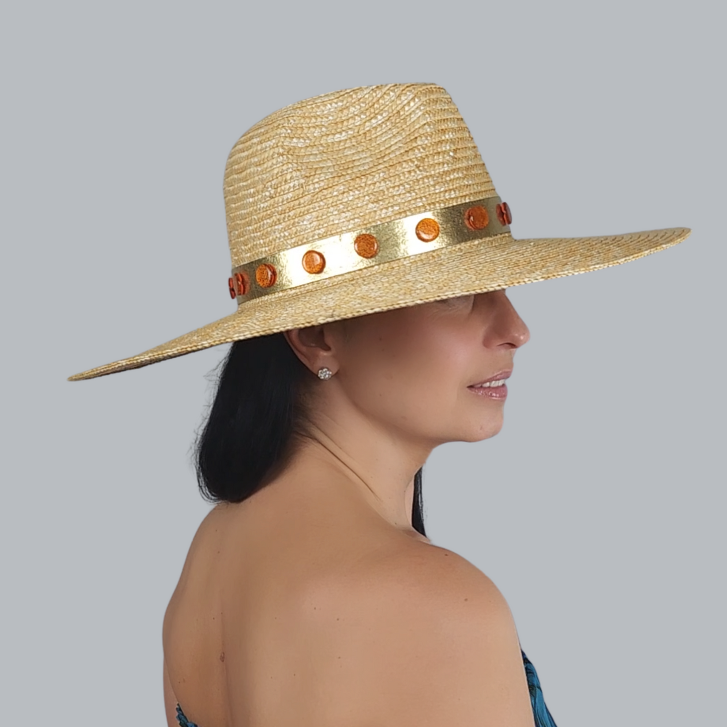 Golden Straw Fedora Hat with Yellow Flower Brooch close side view of the tape