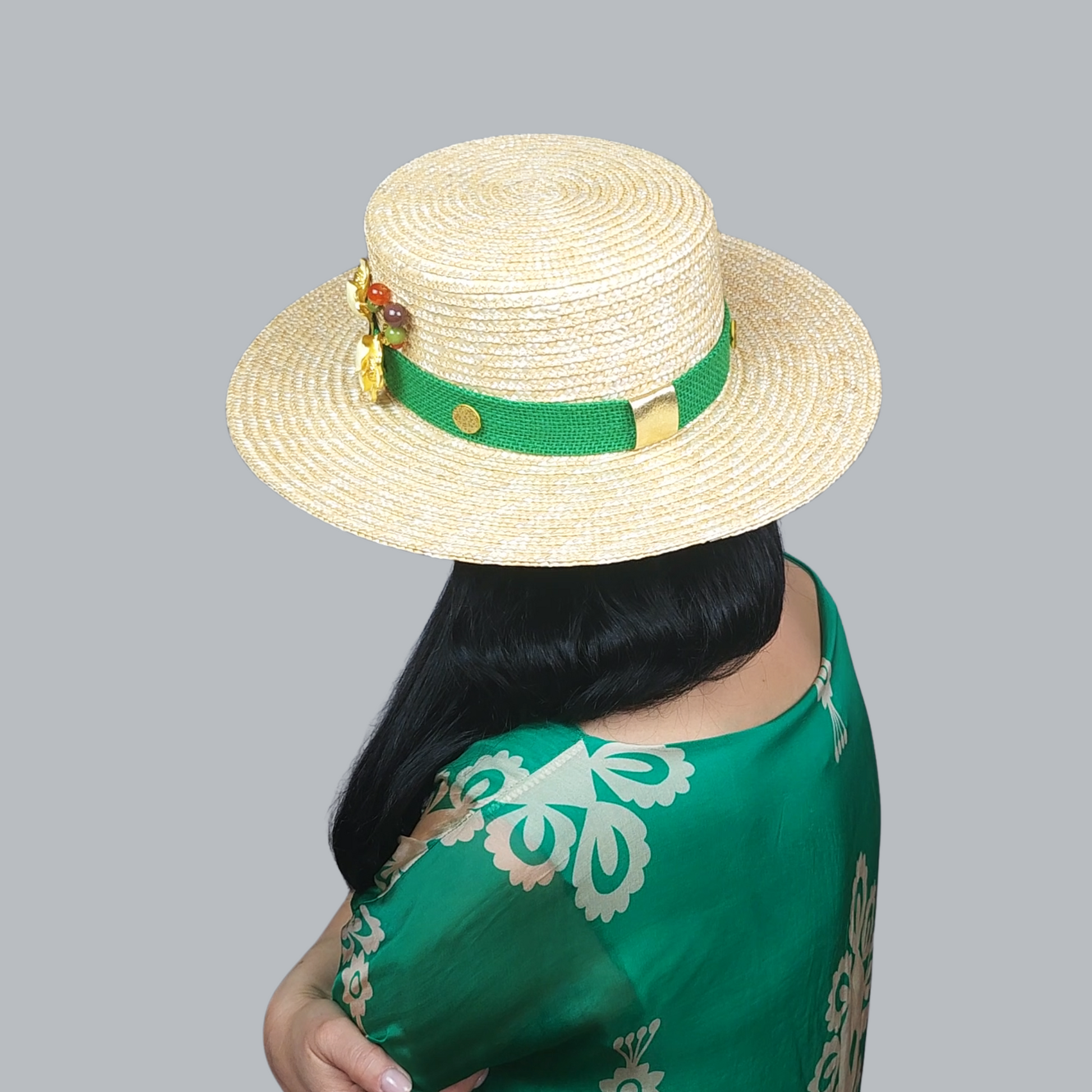Golden Straw Hat with White Flower Brooch – Rear View 