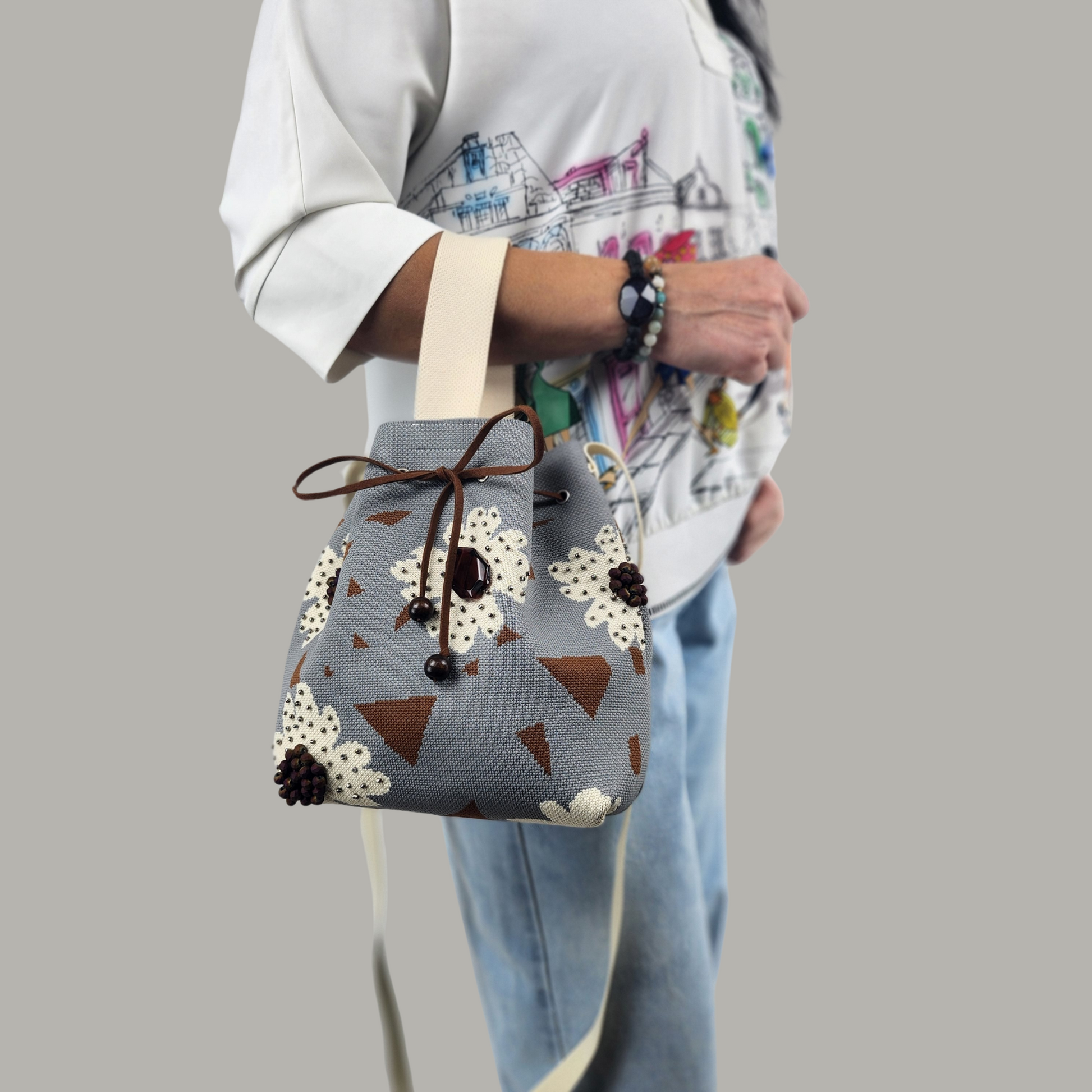 Grey-Beige Fabric Bag with Floral Pattern and Bead Trim-on the arm closer