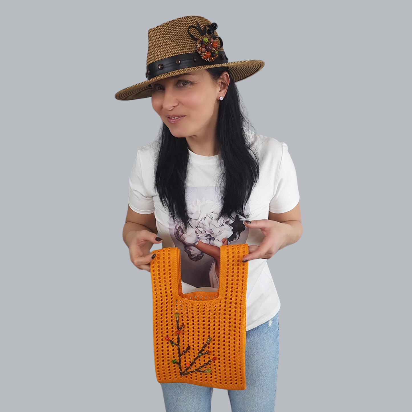 Orange Knitted Fabric Bag with Bead Embroidery-bag in hand is open
