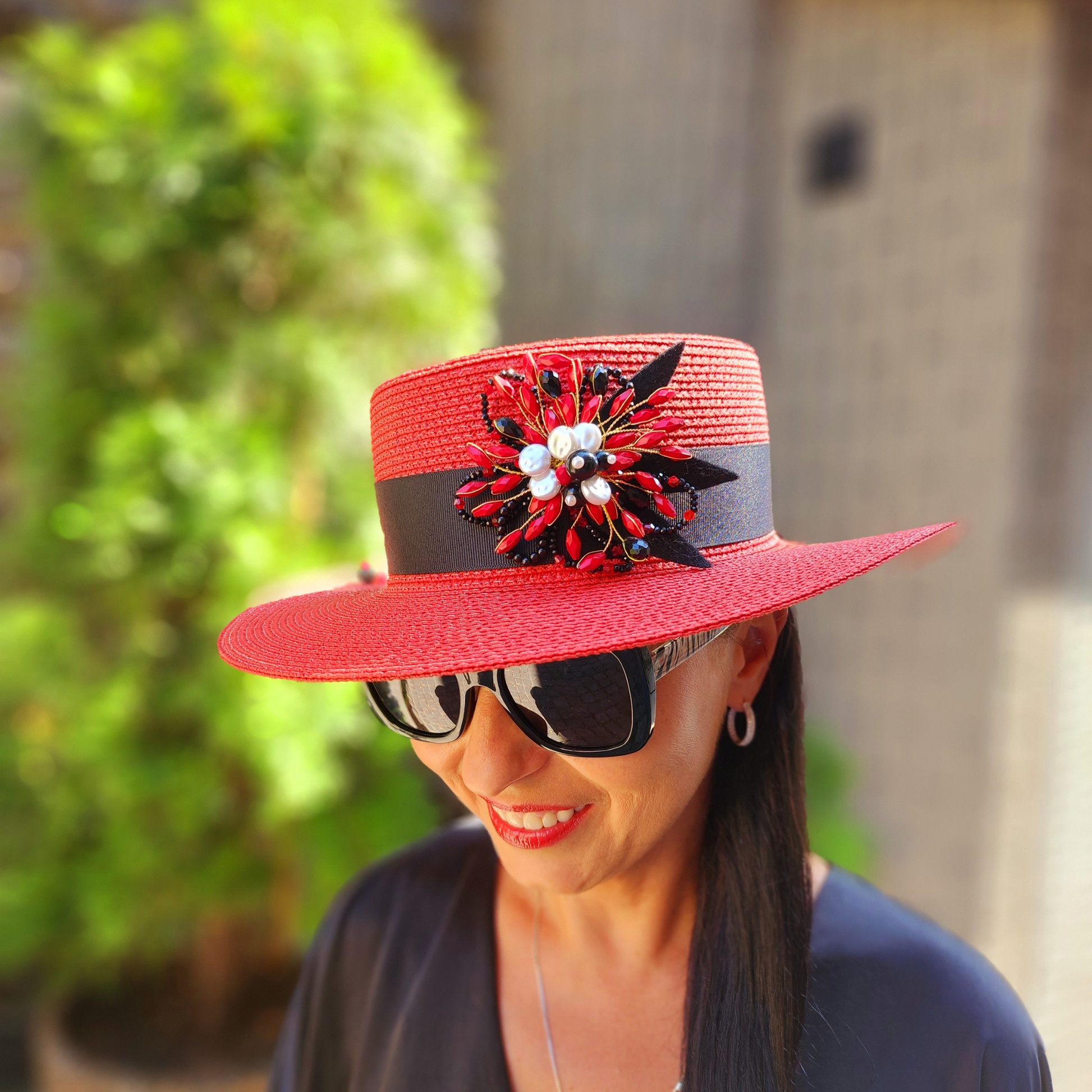 Red Straw Boater Hat with Brooch-a view of the hat on Tatiana's head