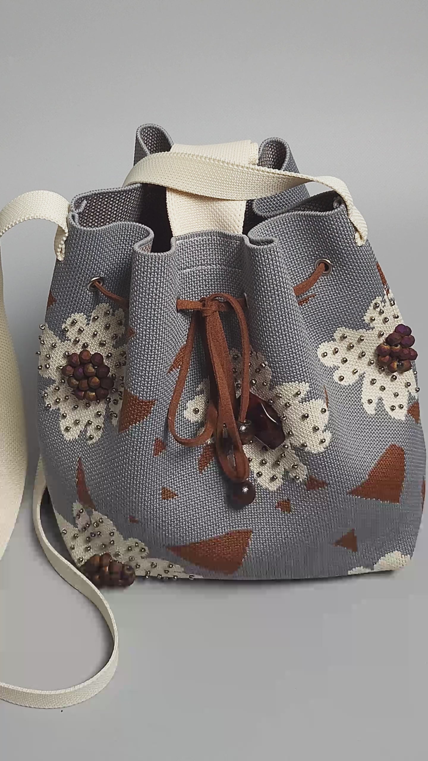 Grey-Beige Fabric Bag with Floral Pattern and Bead Trim-close up video of the finish