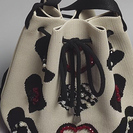 Beige Fabric Bag with Heart Decor-video of decorations and jewelry