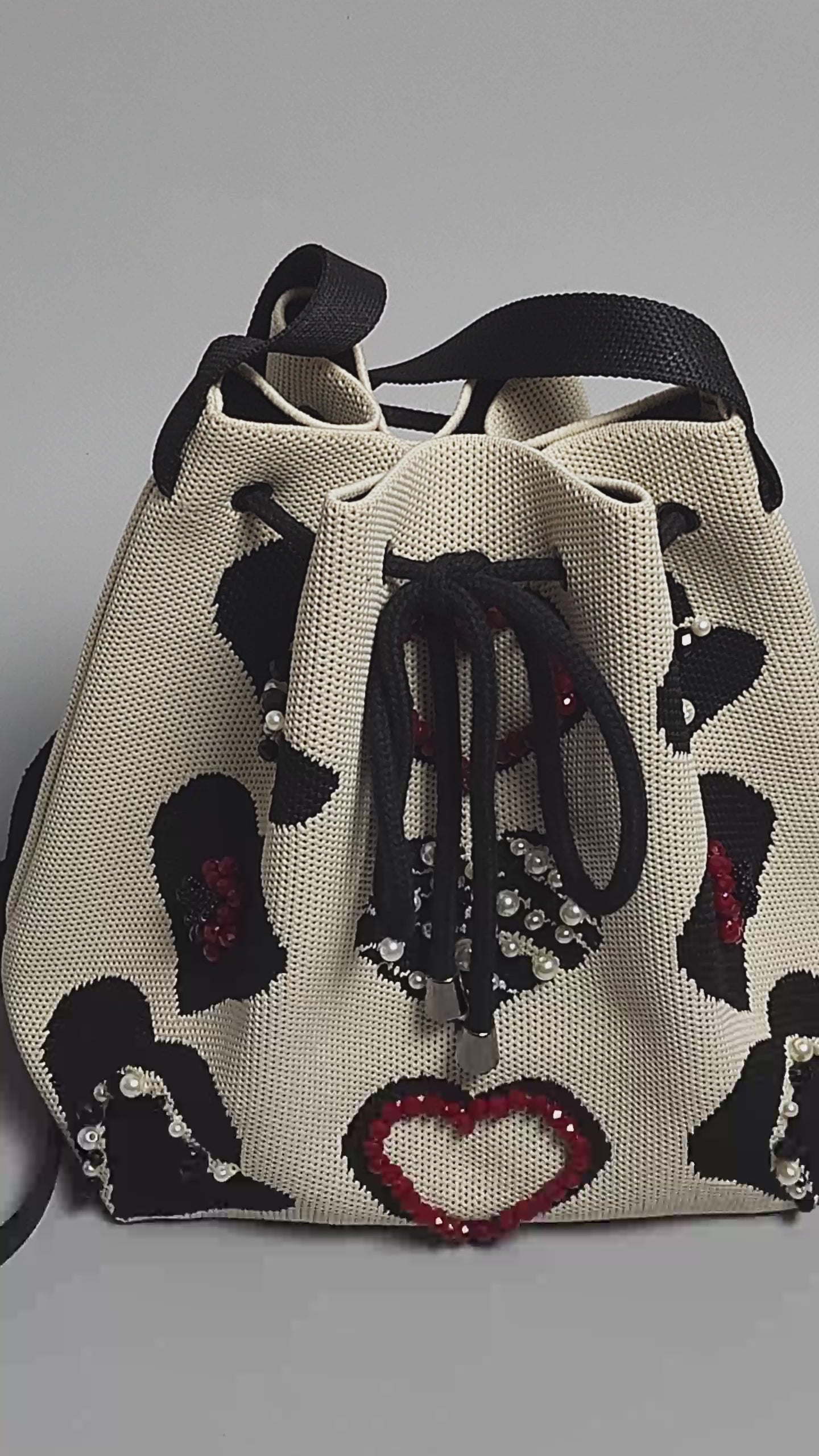 Beige Fabric Bag with Heart Decor-video of decorations and jewelry