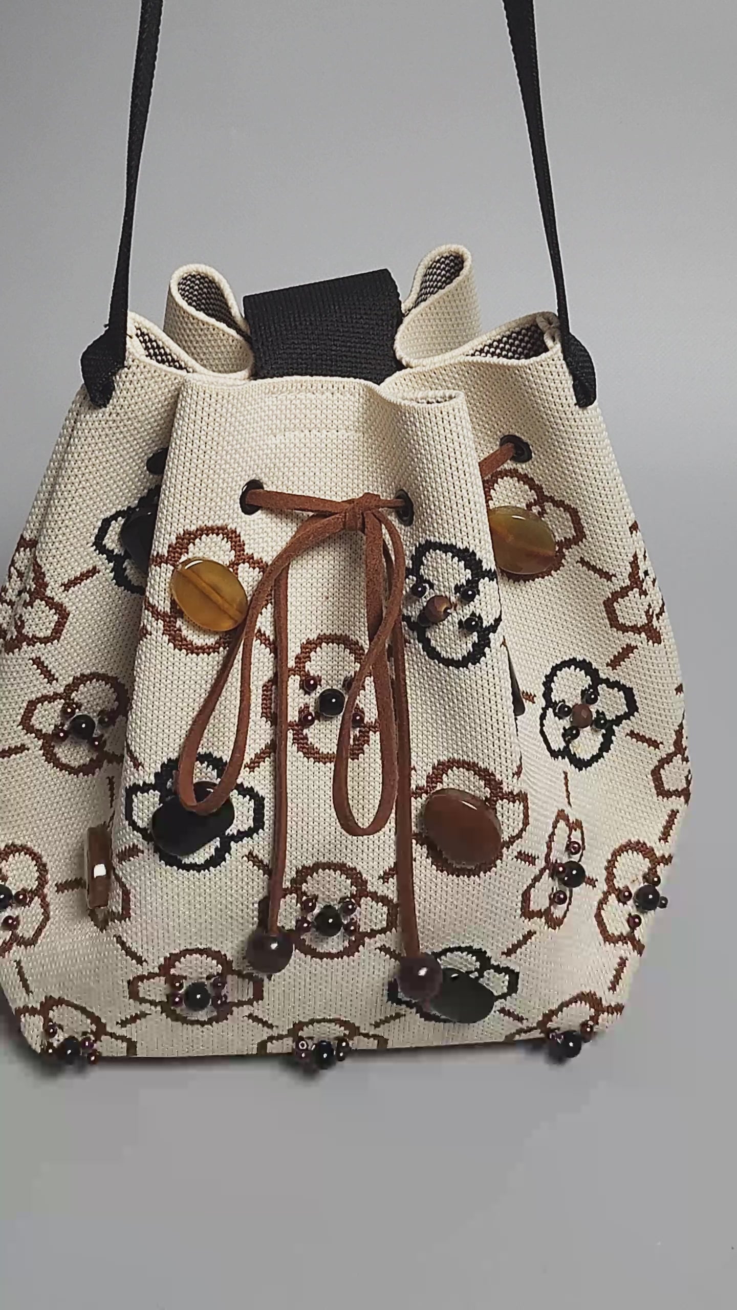 Beige-Black Fabric Bag with Green Pearls-video of bag embellishments on the front 