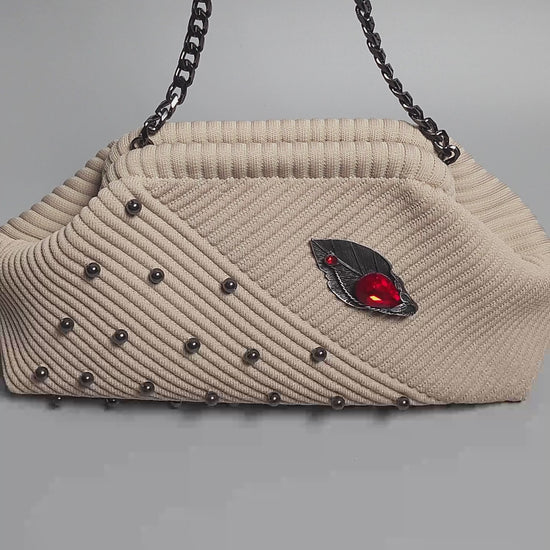 Beige Fabric Bag with Pearl Brooch-video of the bag and jewelry close up